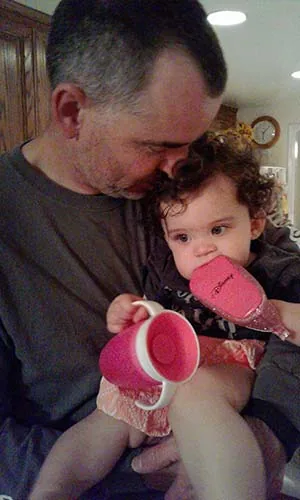 Holding his grandbaby