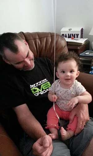 Reading together with his grandbaby
