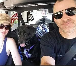In the truck with Jane and Haley the dog