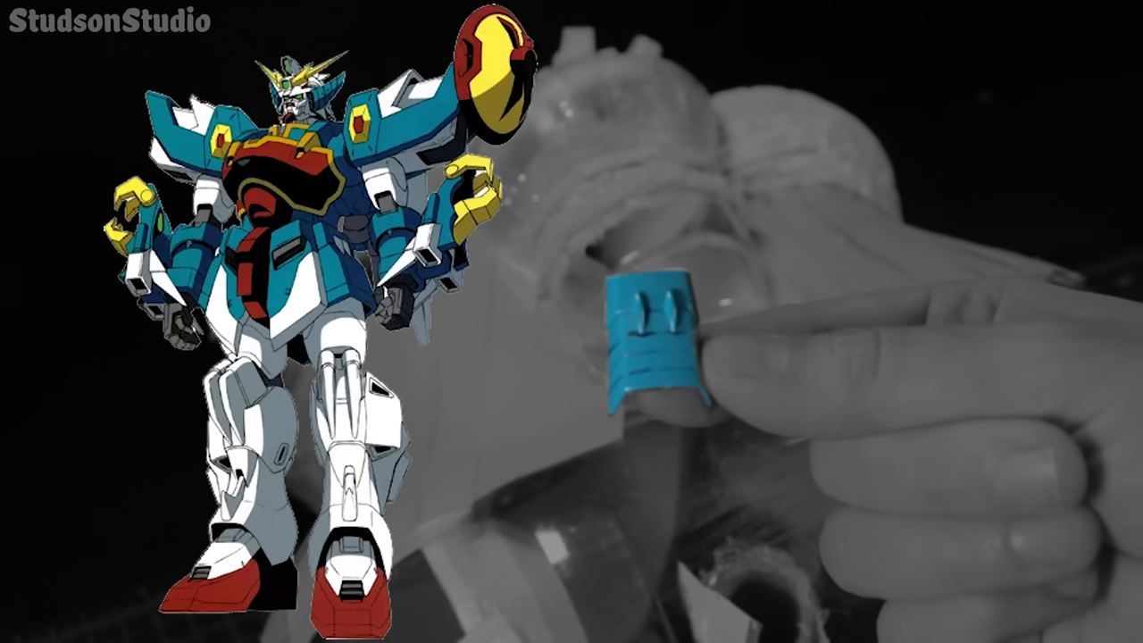 An on-screen graphic showing an "Altron Gundam" figure to illustrate where a specific piece of plastic detail was scavenged from.
