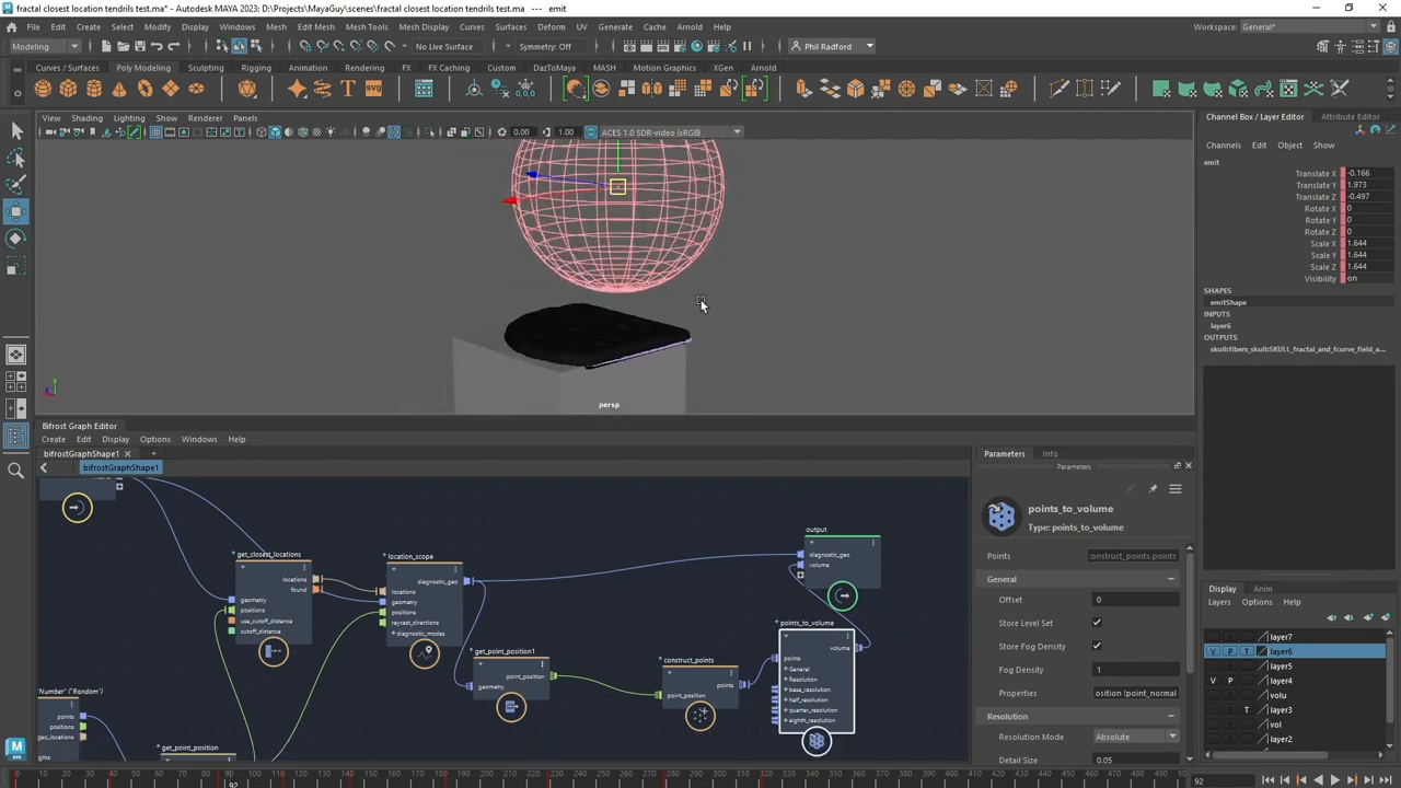 A meshed, lumpy volume appears on the top surface of a cube, directly beneath the wireframe sphere, showing the `points_to_volume` node in action.